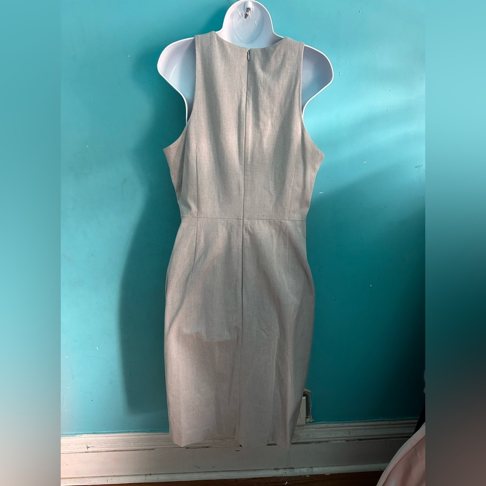 Gray dress stretch and fitted. Great for the office or semi formal event.